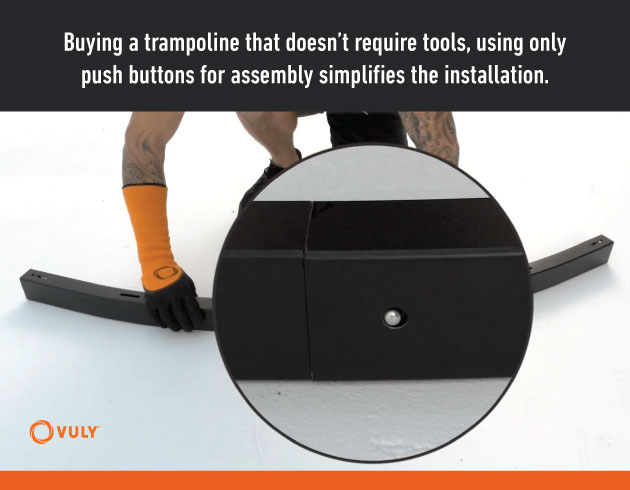 Push buttons being used to connect Vuly trampoline components together